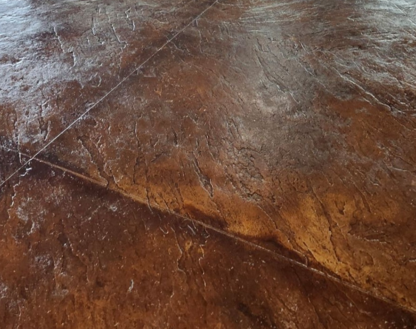 Decorative concrete stamped to look like stone in a home built by Buildgreen Industries in South Carolina.