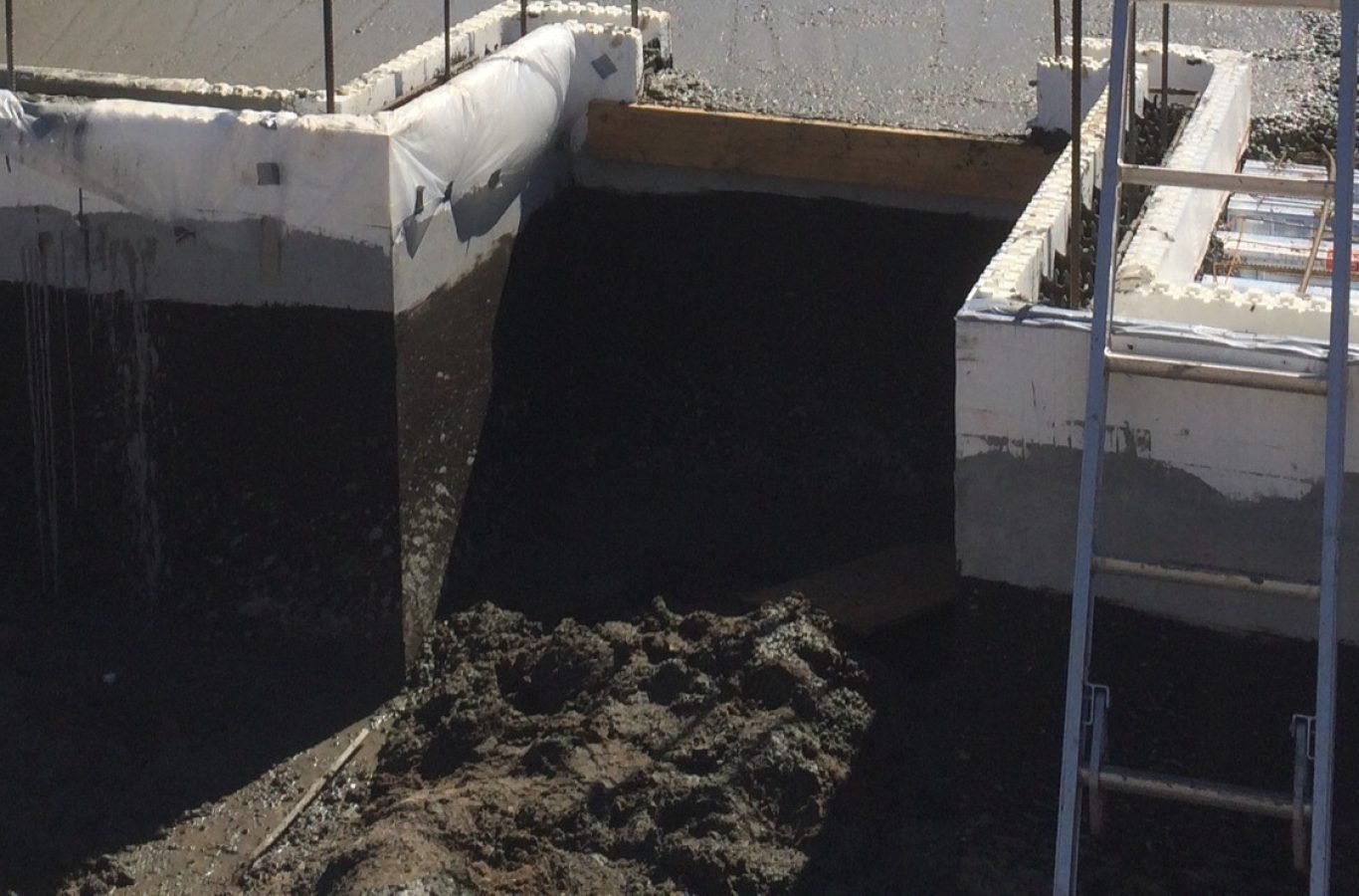 An in progress picture of building a raised concrete floor, a green technology